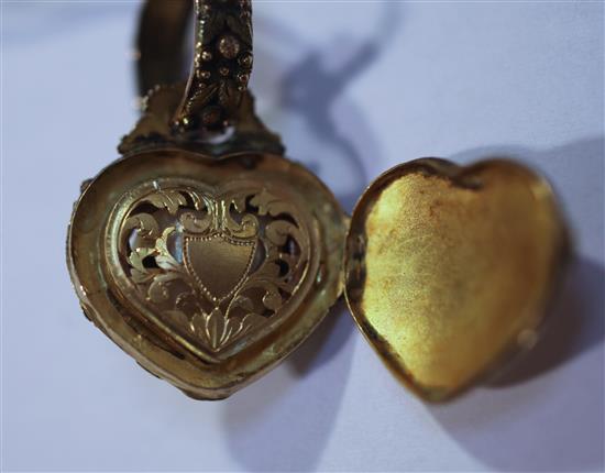 A 19th century three colour gold, baroque pearl and rose cut diamond set heart shaped pendant locket, 1.5in.